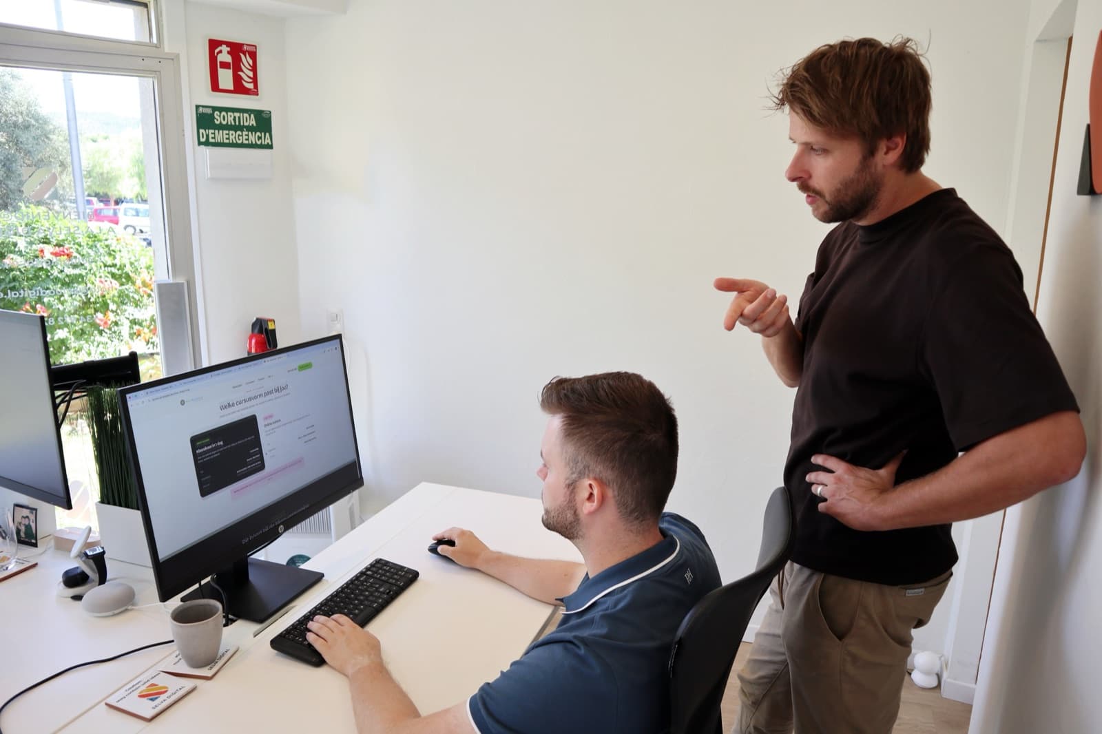 Working through the Quality Estates site together in the office