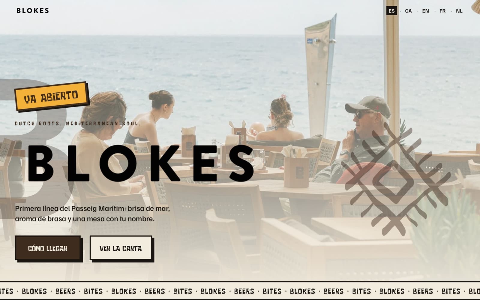 Homepage of blokes.es: the terrace by the sea with the Open now stamp